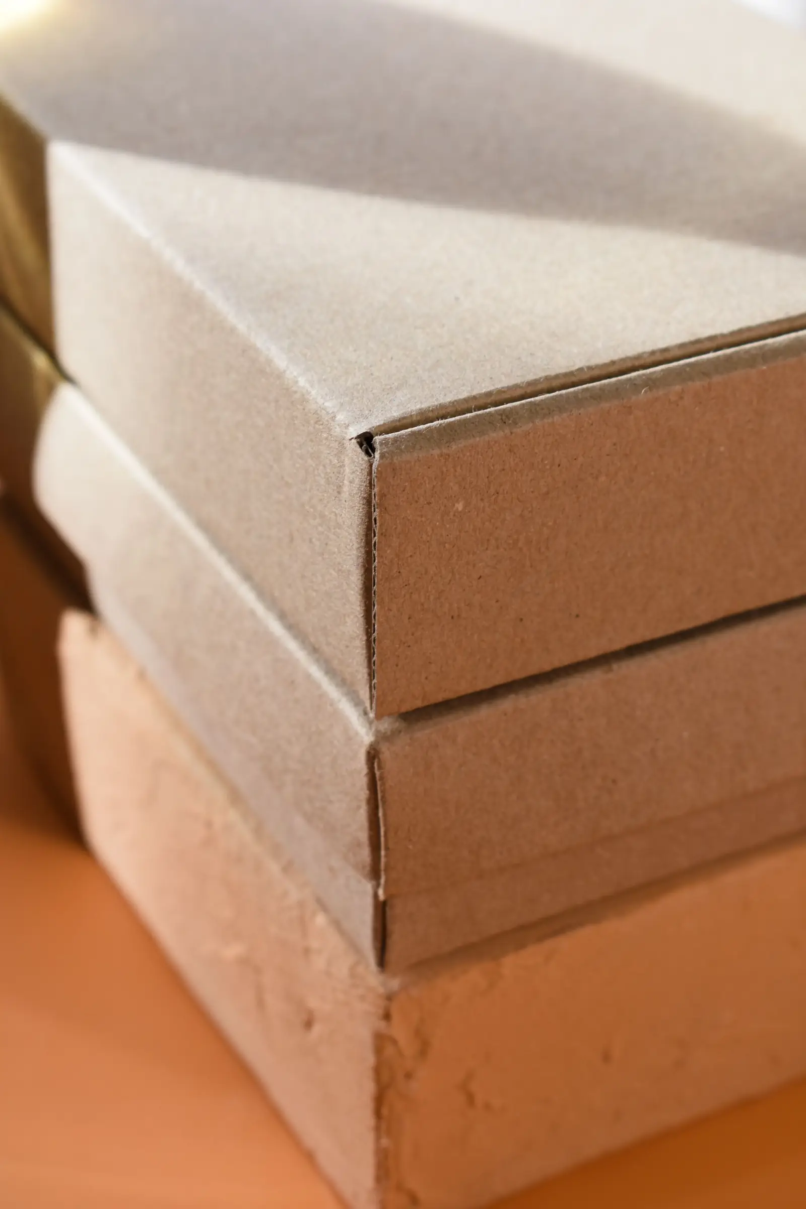 A stack of plain cardboard shipping boxes.